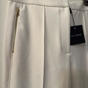 St. John Ivory Pants. Beautiful gold zippers and sophisticated seam detail .